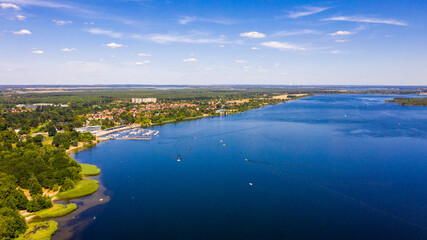 .Aerial drone footage of a large, beautiful view of Senftenberg, a tourist town, sunny day.  beauty of German nature from air