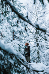 person in winter forest