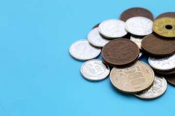 Japan money, Coins on blue background.