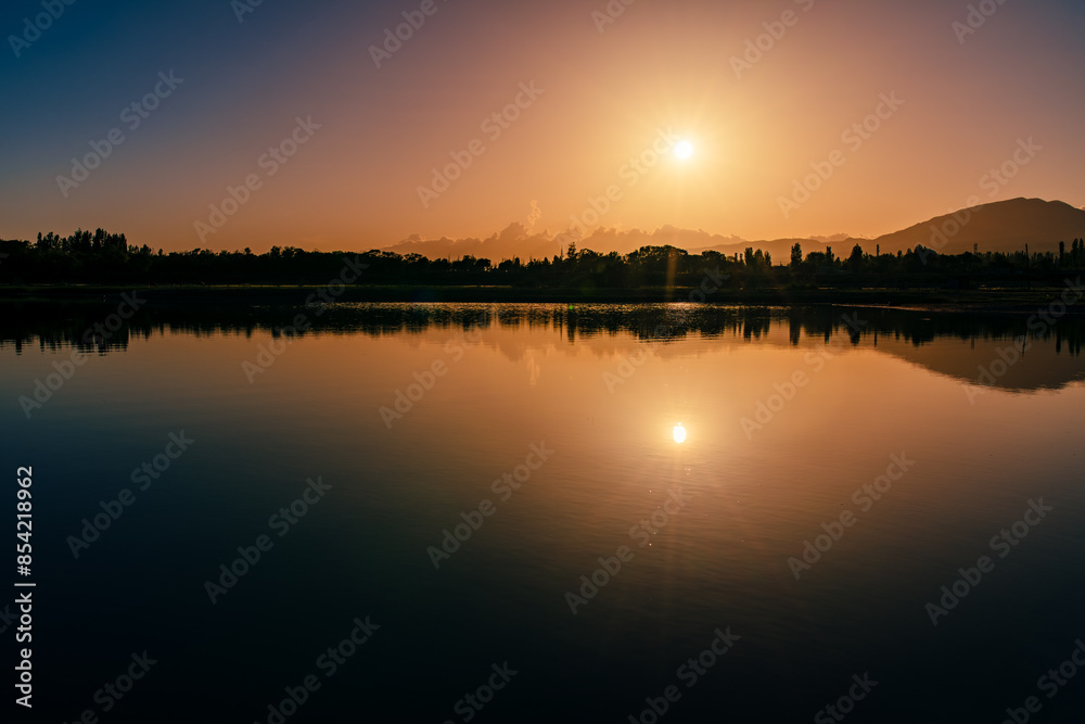 Poster Sunset over lake in summer, contrast dramatic colors