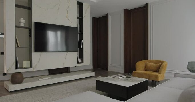 Modern minimalist apartment living room interior design with TV marble cabinet middle table sofa chair door. Modern furniture