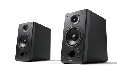 Obraz premium Two Black Speaker Units with Visible Woofers and Tweeters Placed on a Surface - High-Quality Audio Equipment