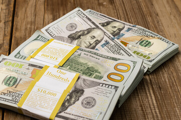 bundles of 100 dollar bills