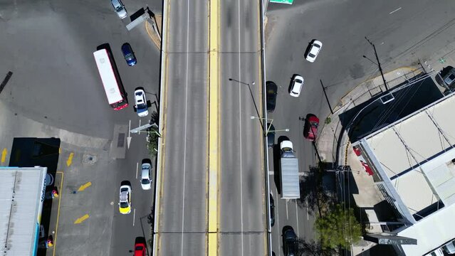 Vertical panning of Mariano Otero Avenue where the millennium arches are revealed in Guadalajara, Mexico