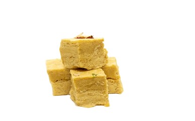 Soan Papdi or Shompapri Garnished with Cashew Nut and Saffron Isolate on White Background with Copy Space