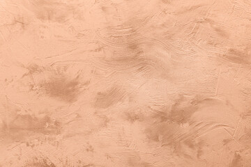 Peach fuzz textured surface, closeup. Trendy shade of 2024 year