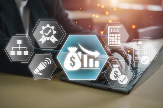 Businessman using laptop with cost reduction icons, showcasing financial efficiency, budget management, and strategic planning for profit growth.