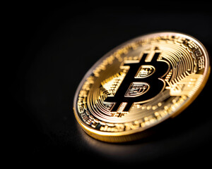 Close-up of a golden Bitcoin coin on a sleek black background minimalistic design, perfect for modern finance and digital currency themes 