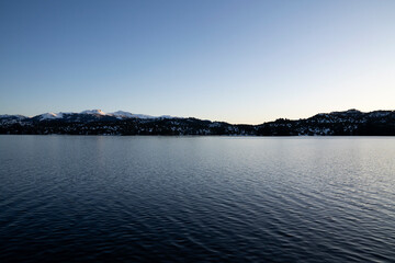 Panorama view of the Andes mountains and Alumine lake, at sunrise, in Villa Pehuenia, Patagonia Argentina.	