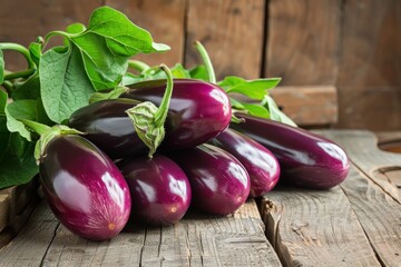 Fresh and Glossy Eggplants: A Group of Vibrant Purple Vegetables on Rustic Wooden Boards