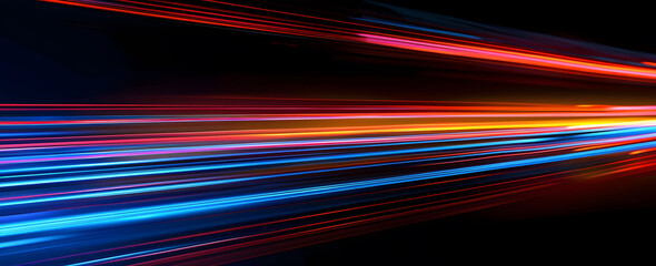 Abstract illustration depicting high-speed light trails in 3D, creating a dynamic and futuristic backdrop. The red and blue light motion trails convey a sense of fast movement and modern technology.