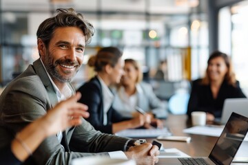 Distinguished business professional leading a meeting with a smile, promoting teamwork and cooperation