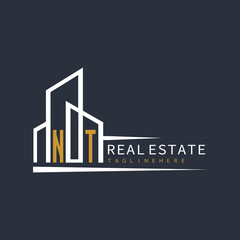 initial monogram logo for real estate with building shape creative design	
