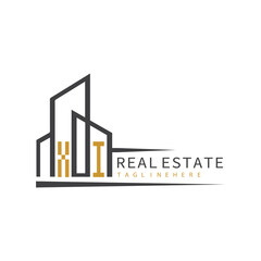 initial monogram logo for real estate with building shape creative design