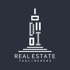 initial monogram logo for real estate with building shape creative design
