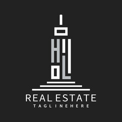 initial monogram logo for real estate with building shape creative design