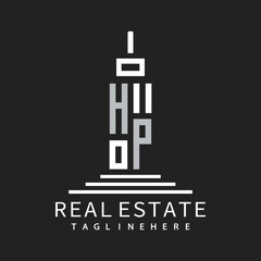 initial monogram logo for real estate with building shape creative design