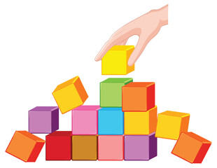 Obraz premium Hand stacking colorful blocks in a pyramid