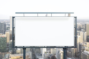Obraz premium Blank white horizontal billboard on skyline background at daytime, front view. Mock up, advertising concept