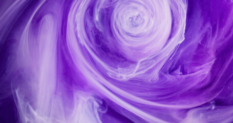 Smoke vortex. Ink cloud. Blur purple color glowing silk haze cloud texture paint floating in water...