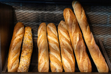 Bread, a fundamental food across cultures, varies in forms from baguettes to naan, loved for its texture and versatility in dishes worldwide.