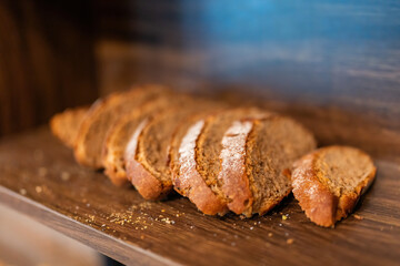 Baking bread from scratch, though time-consuming, rewards with the joy of creating something wholesome and delicious, fostering a deeper connection to food.