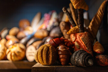 In social settings, breaking bread together signifies camaraderie and hospitality, fostering bonds and shared moments of enjoyment around the dining table.