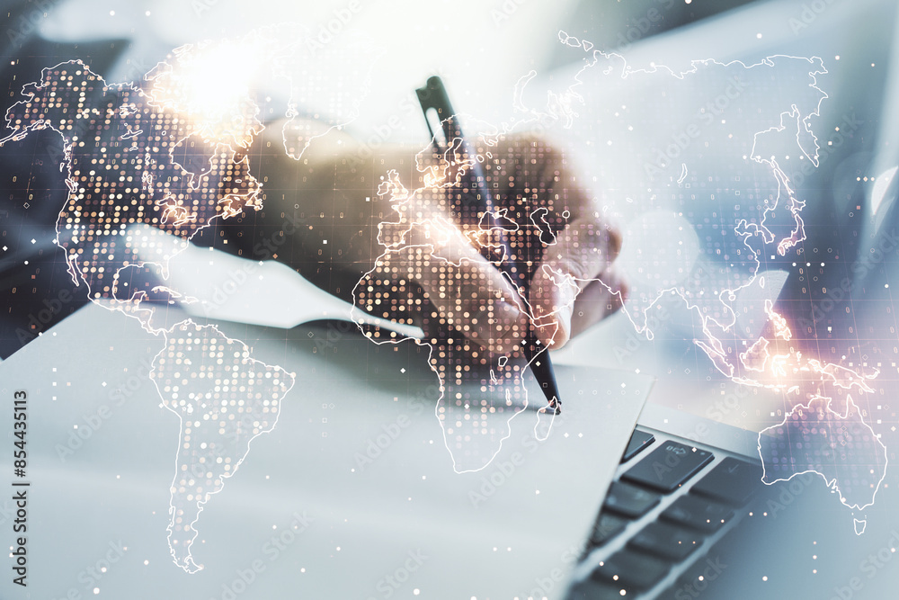 Poster multi exposure of abstract graphic world map and hand writing in notepad on background with laptop, 