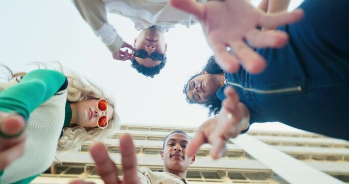 Below, students and group of people at college with cool fashion and university style on campus. Spin, circle and gen z friends together in community with streetwear, clothes and low angle outdoor