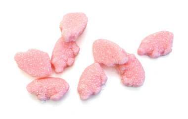Gummy pigs shaped cutter, isolated in glass bowl on white background