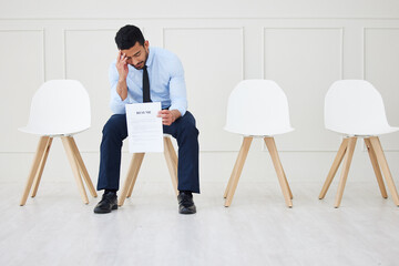Fototapeta premium Recruitment, stress or businessman with resume in waiting room or job interview, opportunity or meeting at hr office. Hiring, anxiety or employee with onboarding, fear or overthinking cv mistake