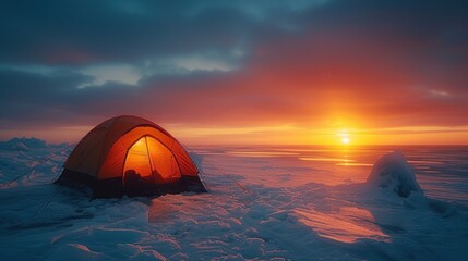 Illuminated Tent on a Snowy Landscape at Twilight