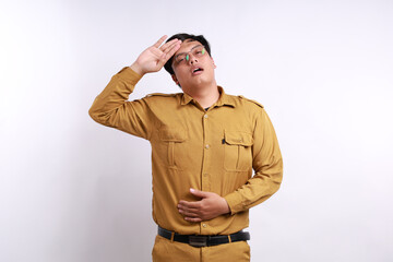 Tired and stressed young indonesian government staff holding her head. Isolated on white