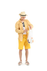Happy young man with string bag and bottles of sunscreen cream isolated on white background