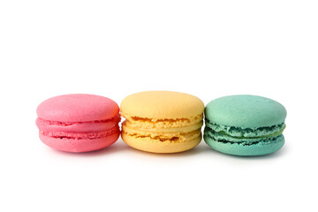 Different tasty sweet macaroons on white background