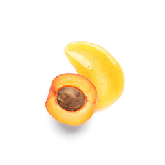 Sweet apricot and smear of jam on white background