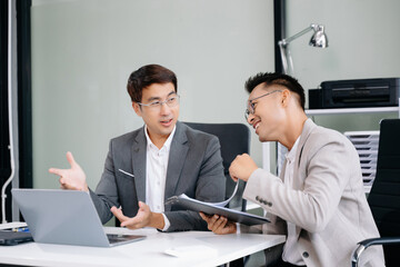 Obraz premium Portrait of success business people working together in modern office. Couple teamwork startup concept 