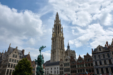 Fototapeta premium View of the gothic cathedral of Our Lady in Antwerp Belgium with gold clock
