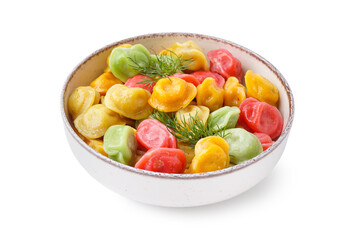 Bowl with boiled colorful dumplings and dill on white background