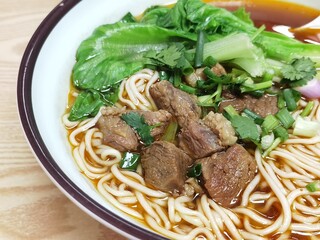 Chinese food, handmade noodle with beef.
