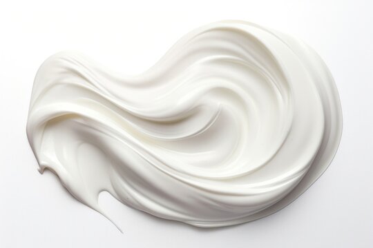 Smeared cream icing white white background.