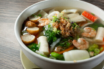 A view of a bowl of seafood pho. © DAVID