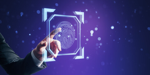 Close up of male hand pointing at creative digital security hologram on purple background with mock up place. Web protection concept.