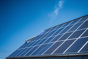 Solar panels on a modern house roof eco-friendly energy