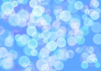 Blurred lights. Bubble blower. Blurred street lights in the evening. Glitter. Blue background with sparkles.