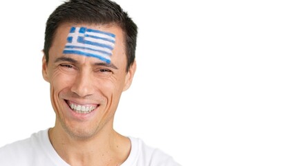 Man with a greek flag painted on the face smiling
