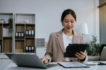 Businesswomen working with smart phone and laptop and digital tablet computer in office with digital marketing media in virtual icon.