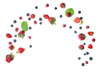 Flying different fresh berries and leaves on white background