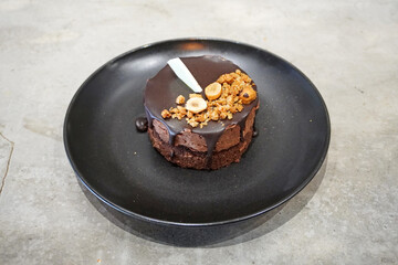 French Chocolate cake on black color dish