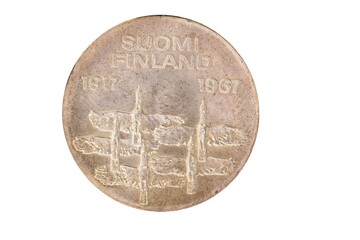 Closeup of backside of 10 markka commemorative coin of 50 year independent Finland, minted in 1967.